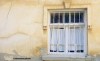 A crooked old window in Ohrid, North Macedonia