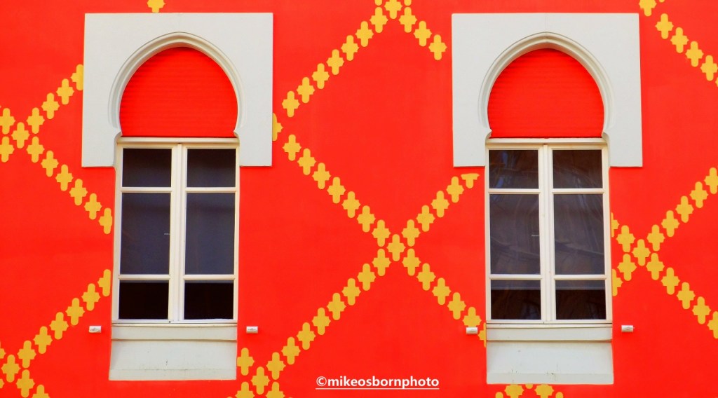 Bright red building in central Tirana, Albania