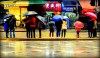 Pedestrians under umbrellas on Electric Avenue, Hong Kong