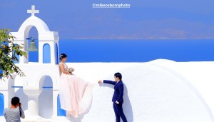 Newlyweds in Oia, Santorini, Greece
