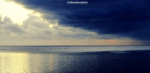 Storm over a Pacific lagoon in Fiji