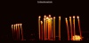 Lit candles in Armenia church
