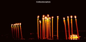 Lit candles in Armenia church