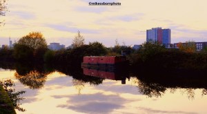 Red narrow boat on Bridgewater Canal, Manchester