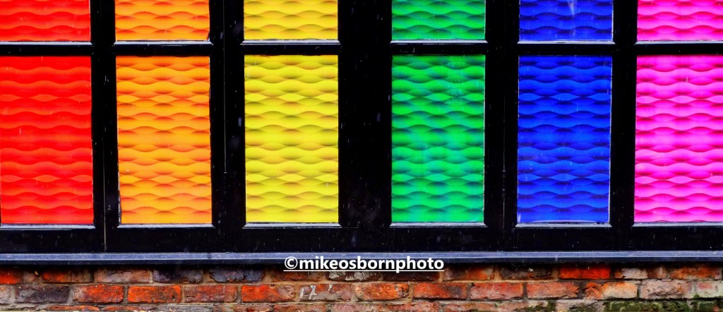Rainbow window design on Canal Street, Manchester