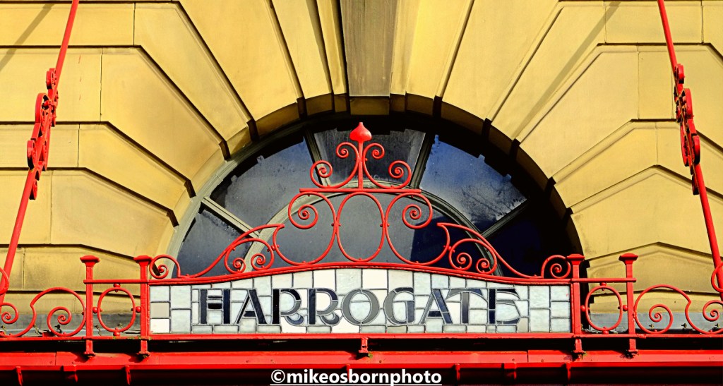 Sign for Harrogate on Victoria Station, Manchester