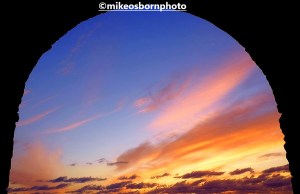 The sunset in Fuerteventura, Canary Islands framed in an arched window