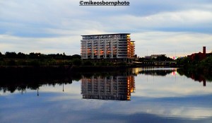 A new apartment block at Pomona, Manchester reflected in the Ship Canal