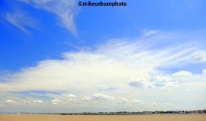 The Wirral town of Hoylake seen from the beach at low tide