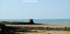 The stump of a lighthouse by the sea at Heysham