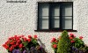 Front window of cottage in Worsley village