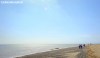Hikers on the beach at Spurn Point, East Yorkshire