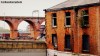 Derelict building and railway viaduct in Stockport