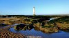 A view of Perch Rock lighthouse on New Brighton beach, Wirral