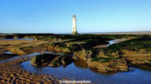 A view of Perch Rock lighthouse on New Brighton beach, Wirral