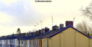 A street of terraced houses and rooftops in Clitheroe, Lancashire, UK
