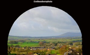 Framed view of Lancashire's Ribble valley from Clitheroe castle