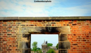 Gardener's cottage peeks through wall at RHS Bridgewater