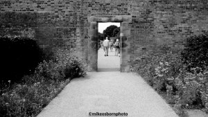 Visitors in walled garden at RHS Bridgewater