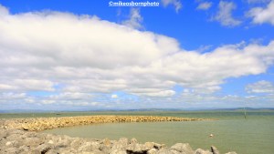 A stone coastal breakwater at Morecambe, Lancashire, UK