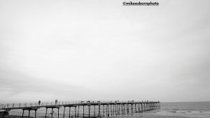 A black and white minimalist view of Saltburn pier