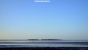 Hilbre Island in the mouth of the Dee Estuary on a bright winter's day