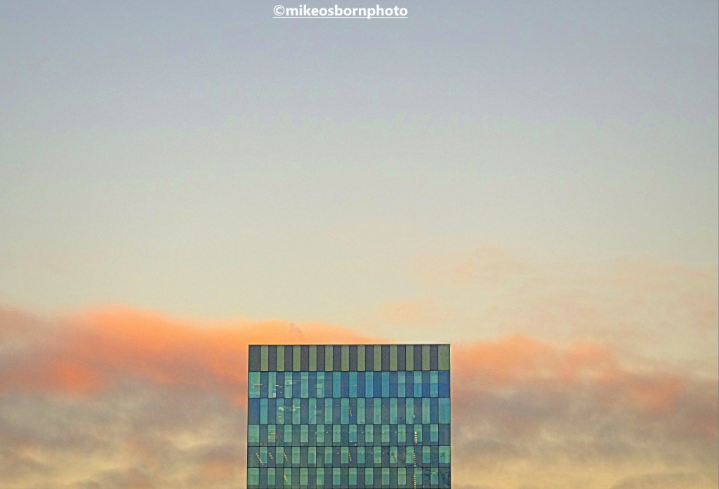 20 Stories in Spinningfields, Manchester caught by a peachy winter dusk