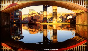 Strong reflections in the canal at Castlefield in Manchester on a cold winter's day