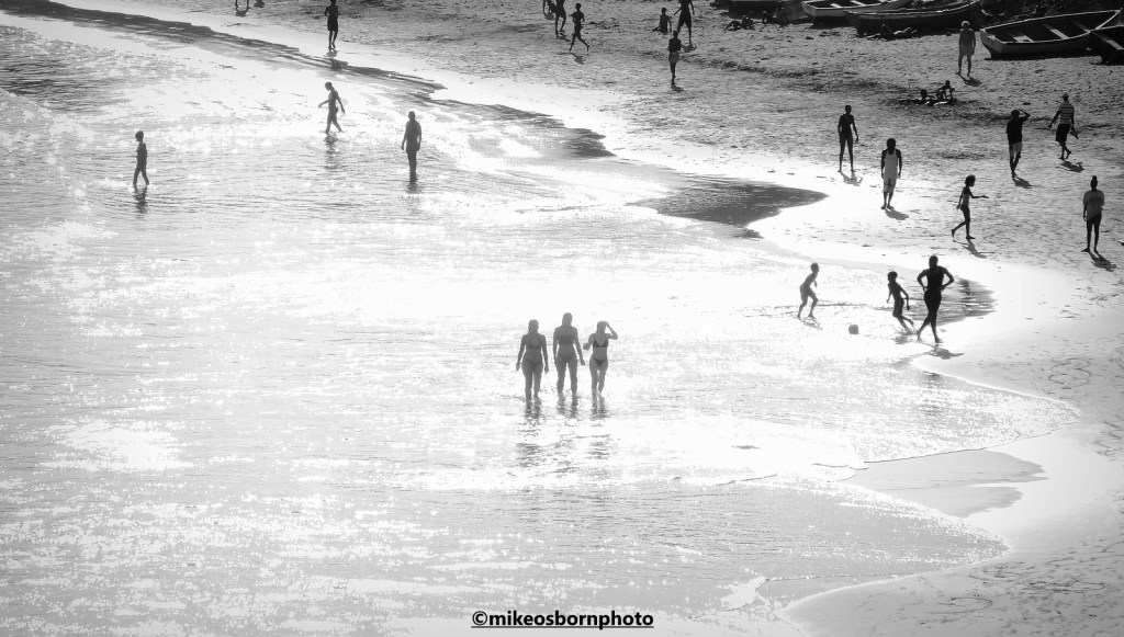 Beachgoers at Quebra Canela on Santiago island, Cape Verde