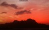 A rich scarlet sunset over Santo Antão, Cape Verde, as seen from Mindelo