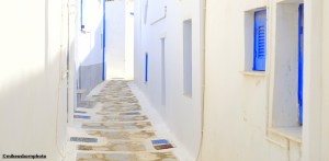 A whitewashed and blue little back street in Tinos town in the Greek islands
