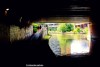 Reflections on the Bridgewater Canal at an underpass in Castlefield, Manchester