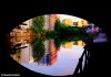 A tunnel along the River Irwell catching dusk reflections on a summer evening