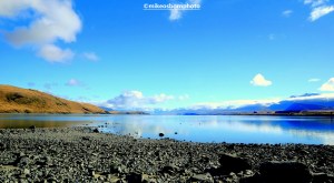 Lake shores reflecting the blue sky in New Zealand's South Island.