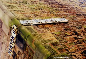 Two old streets signs on a corner in the city of Lancaster, UK.