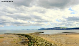 A sea defence shaped like a fish tail at Rhos-on-Sea in north Wales.