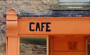 A simple sign for a cafe in the old English city of Lancaster.