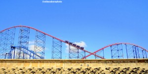 Blackpool's famous rollercoaster The Big One in action, viewed from the nearby beach.