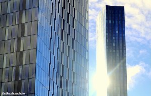 The sun bounces off The Blade skyscraper in Manchester.