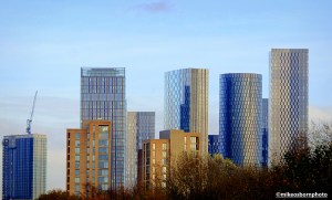 The tall buildings of New Jackson and Botanica stand out against a clear blue winter sky.