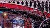Snow-covered tree branches set against a railway bridge in Castlefield, Manchester.