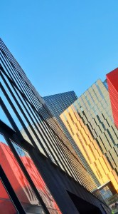 Brightly coloured new buildings at First Street, Manchester on a sunny winter's day.