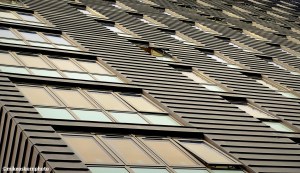 The facade of a modern apartment building on Manchester's Oxford Road.