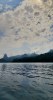 A view of the peaks of Príncipe island as seen from a boat on the Atlantic Ocean.