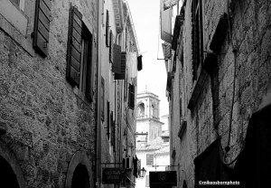 The walls of an old street leading to a piazza in the city of Kotor, Montenegro.