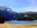 A panoramic view of the Black Lake and surrounding mountains in Montenegro.