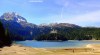 A panoramic view of the Black Lake and surrounding mountains in Montenegro.