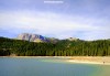 A view of the mountains and forests surrounding the Black Lake in Montenegro.