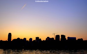 Rotterdam buildings silhouetted against the sunset.
