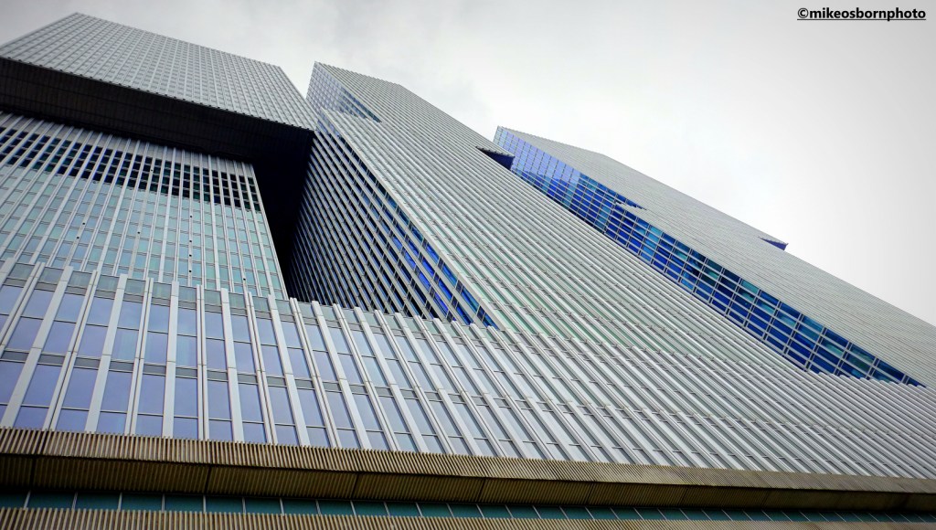 Looking up at the striking, tall De Rotterdam buildings near the Erasmusbrug.